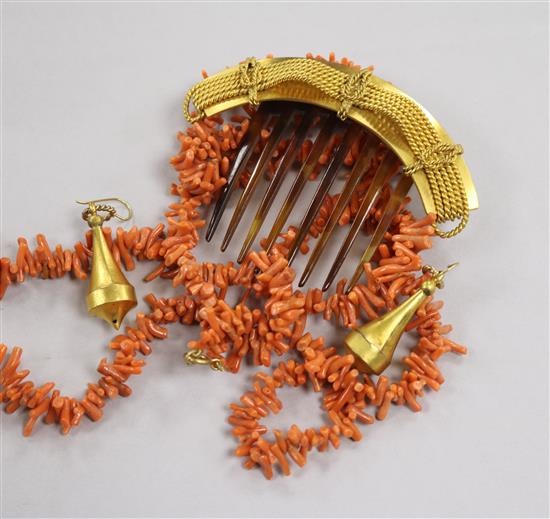 A pair of pinchbeck earrings, a similar hair comb and a coral necklace.